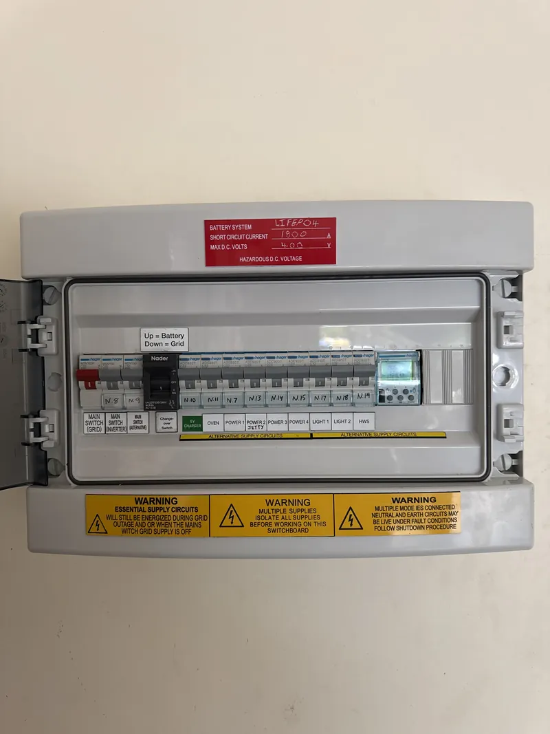 Weatherproof external enclosure housing battery isolation switchgear